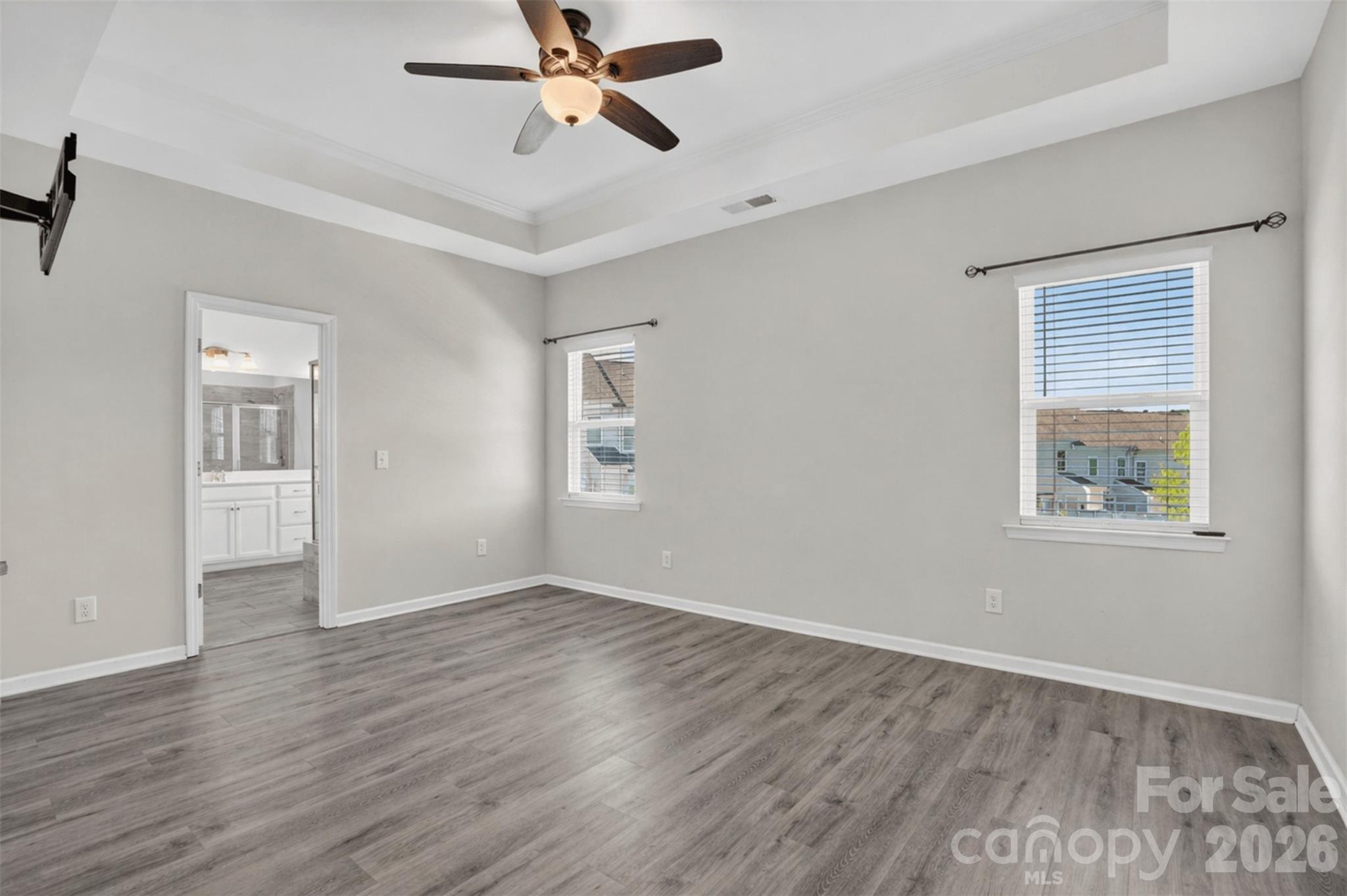 764 River Park Road Belmont, NC 28012 - Photo 21 of 27 a view of an empty room with a window and wooden floor