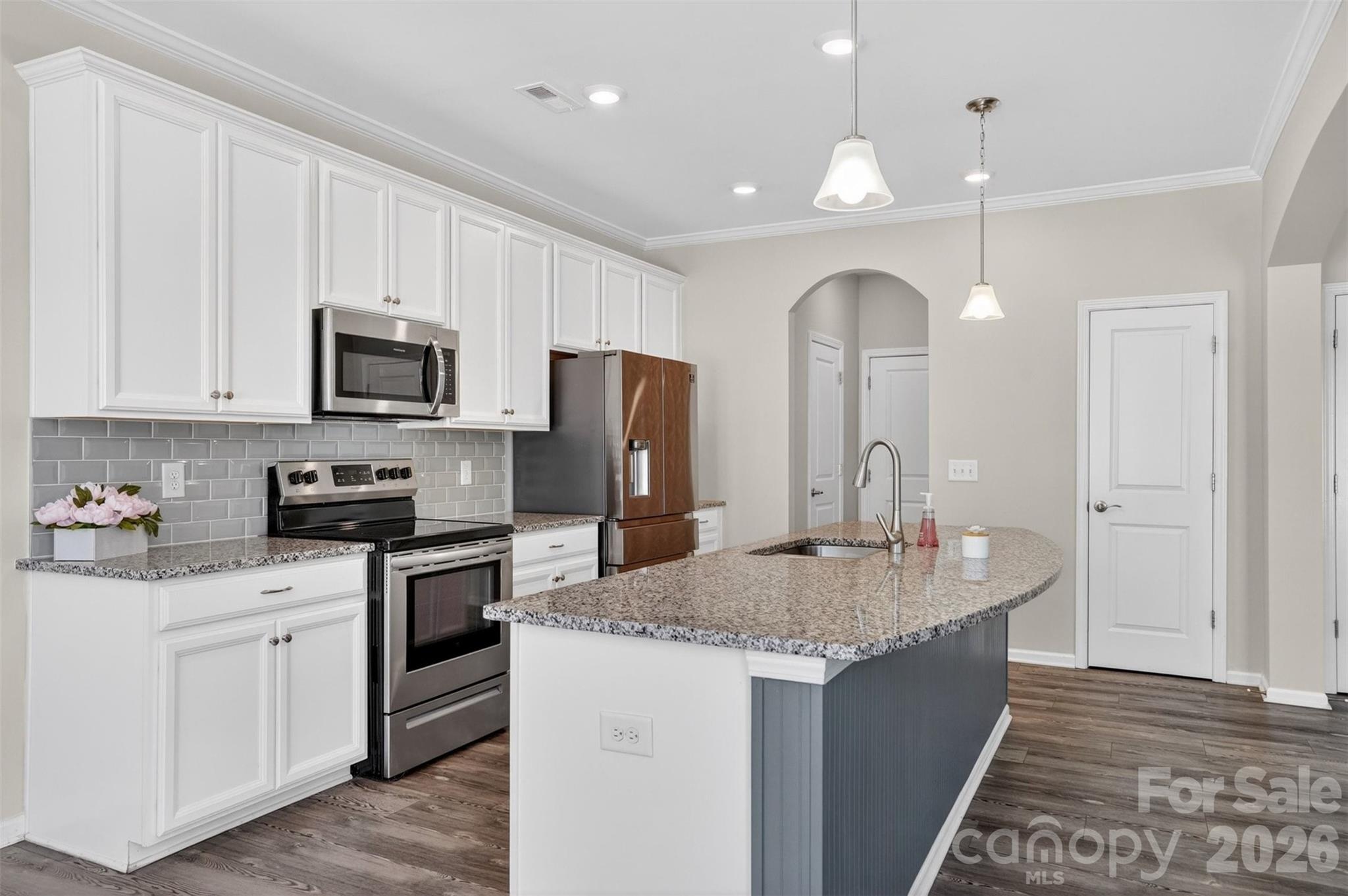 764 River Park Road Belmont, NC 28012 - Photo 6 of 27 a kitchen with sink a microwave and cabinets