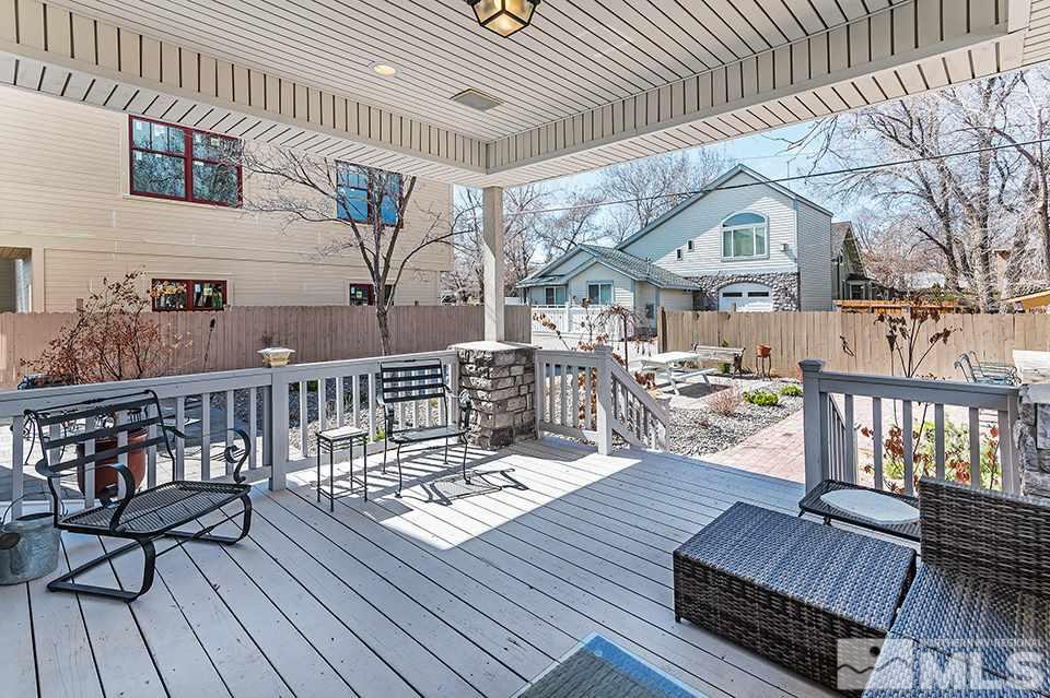 635 South Arlington Avenue Reno, NV 89509 - Photo 14 of 25 a view of a roof deck with wooden floor and fence