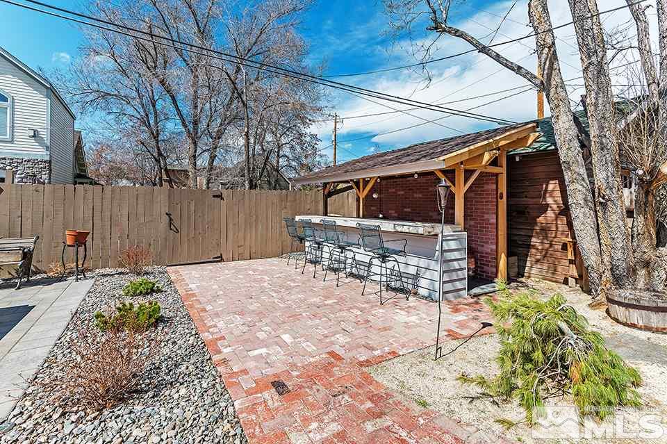 635 South Arlington Avenue Reno, NV 89509 - Photo 15 of 25 a house with trees in front of it