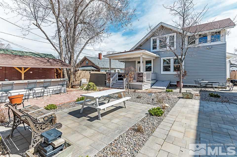 635 South Arlington Avenue Reno, NV 89509 - Photo 16 of 25 a front view of a house with garden and sitting area