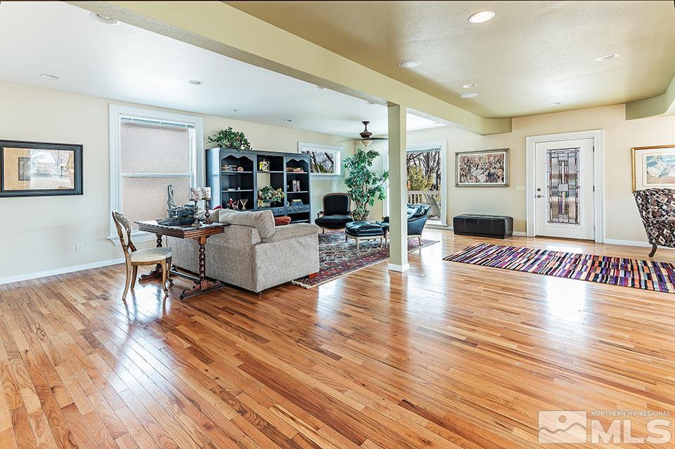 635 South Arlington Avenue Reno, NV 89509 - Photo 5 of 25 a living room with fireplace furniture and a wooden floor