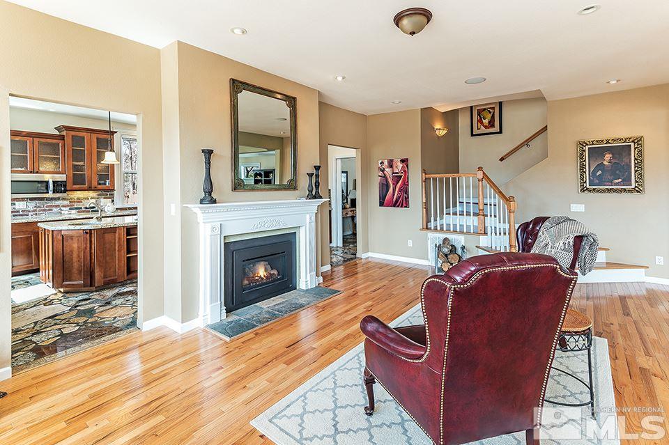 635 South Arlington Avenue Reno, NV 89509 - Photo 7 of 25 a living room with furniture and a fireplace