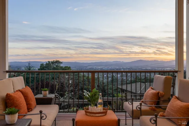 a view of a balcony with couch