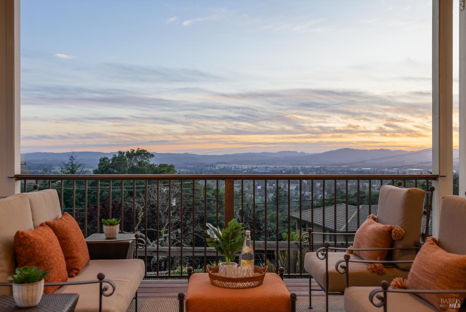 a view of a balcony with couch