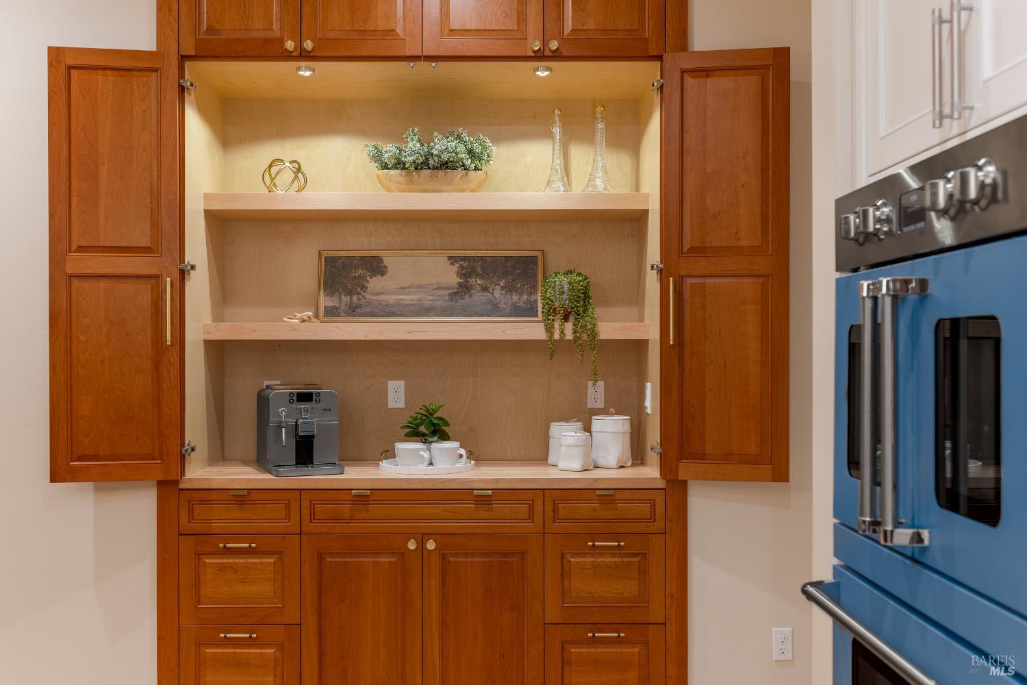1335 Wikiup Drive Santa Rosa, CA 95403 - Photo 14 of 48 a kitchen with a sink and wooden cabinets