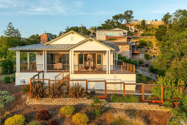 a front view of a house with swimming pool