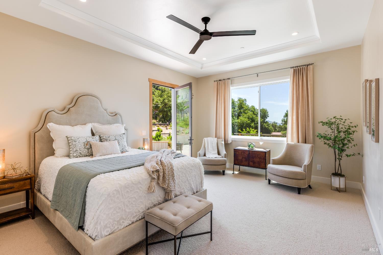 1335 Wikiup Drive Santa Rosa, CA 95403 - Photo 30 of 48 a bedroom with a bed a couch and a window