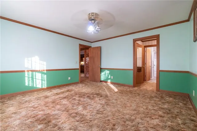 a kitchen with a stove and cabinets