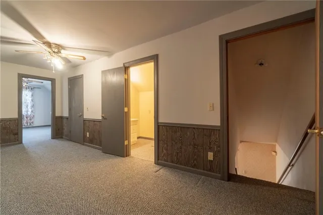 a room with gym equipment and a window