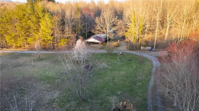 a view of a playground with basketball court