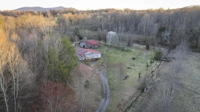 a view of a room with a window and a table