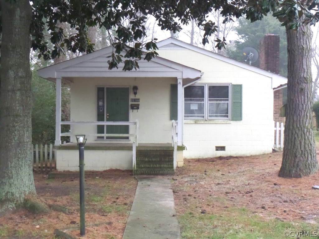 21300 Rutledge Avenue Petersburg, VA 23803 - Photo 1 of 21 a front view of a house with garden