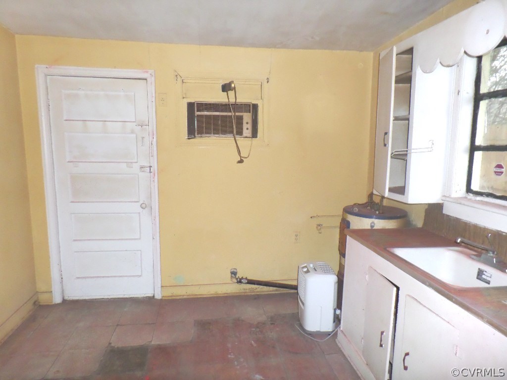 21300 Rutledge Avenue Petersburg, VA 23803 - Photo 17 of 21 a room with a sink and a window