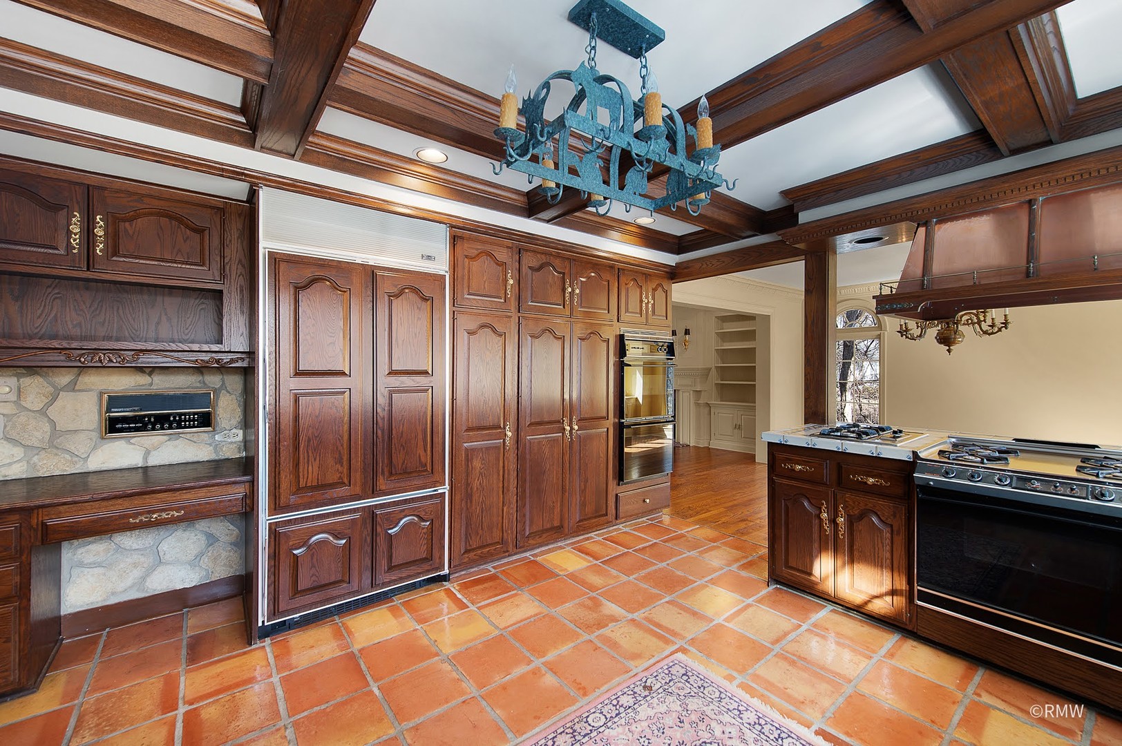 27W161 Mack Road Wheaton, IL 60189 - Photo 14 of 39 a kitchen with stainless steel appliances granite countertop a stove a sink and a refrigerator