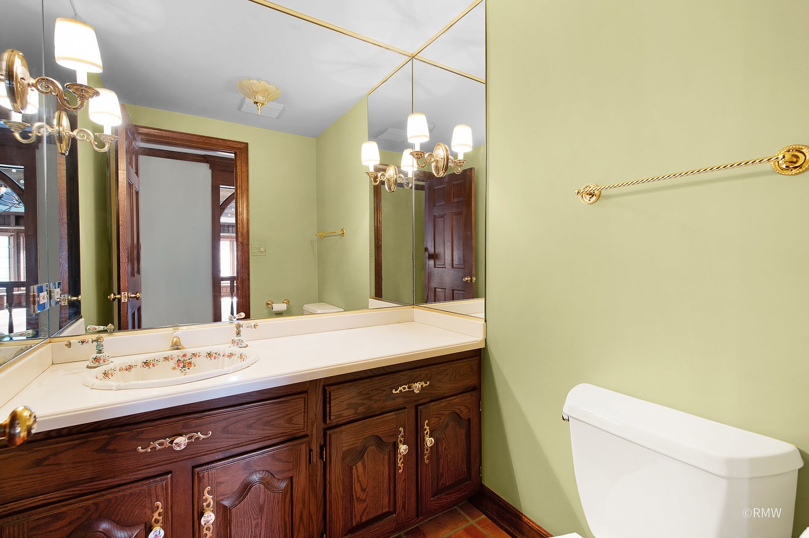 27W161 Mack Road Wheaton, IL 60189 - Photo 17 of 39 a bathroom with a double vanity sink mirror and toilet