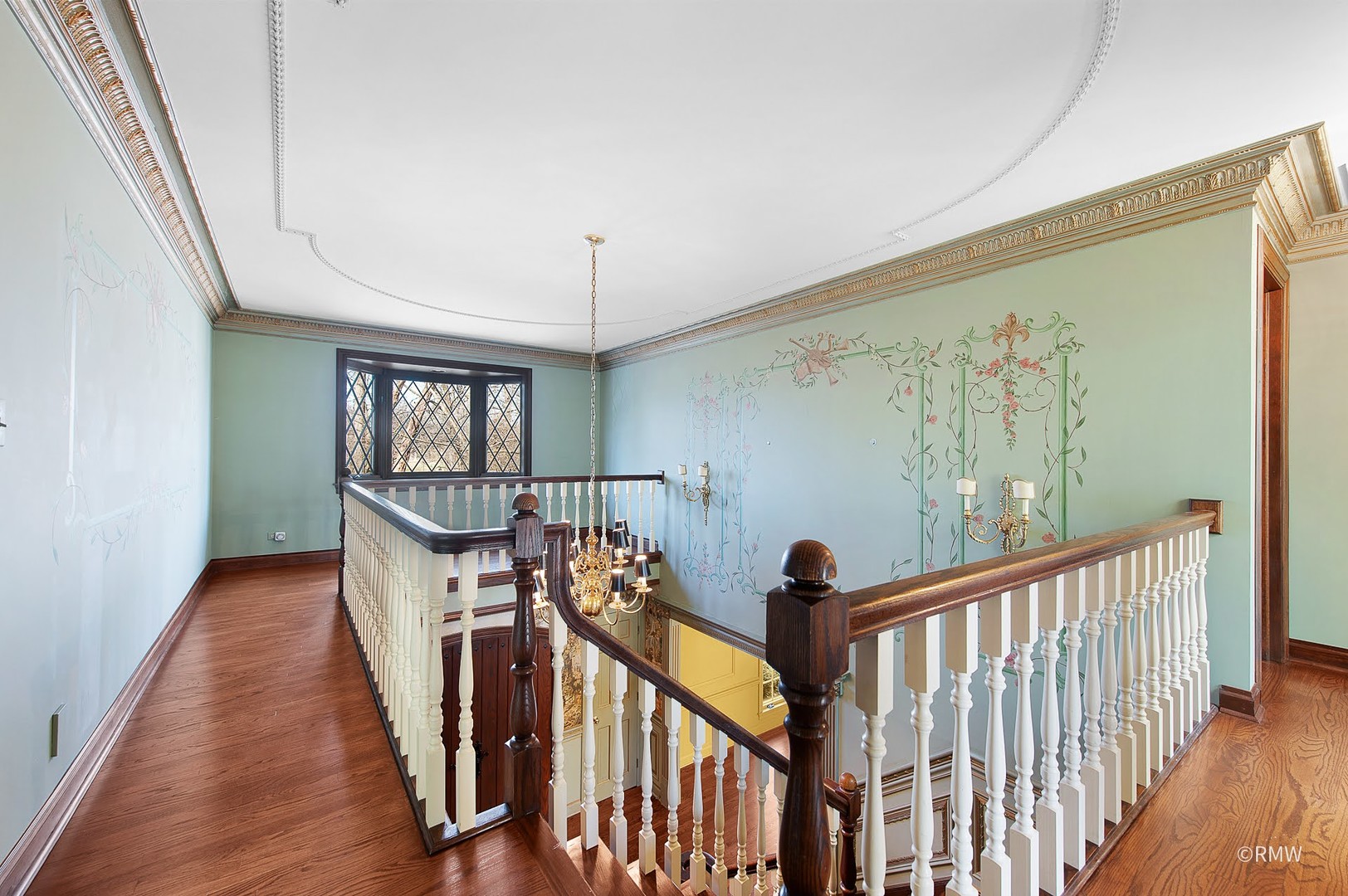 27W161 Mack Road Wheaton, IL 60189 - Photo 19 of 39 a view of entryway and hall with wooden floor