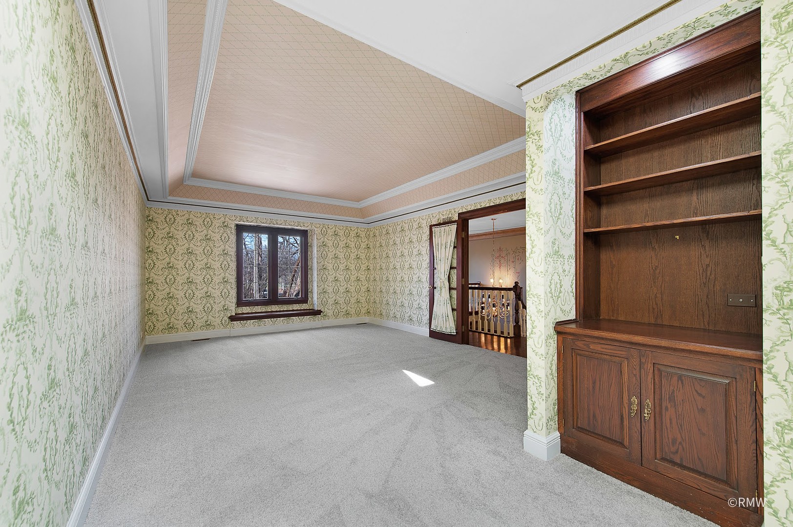 27W161 Mack Road Wheaton, IL 60189 - Photo 21 of 39 a view of an empty room with a window and fireplace