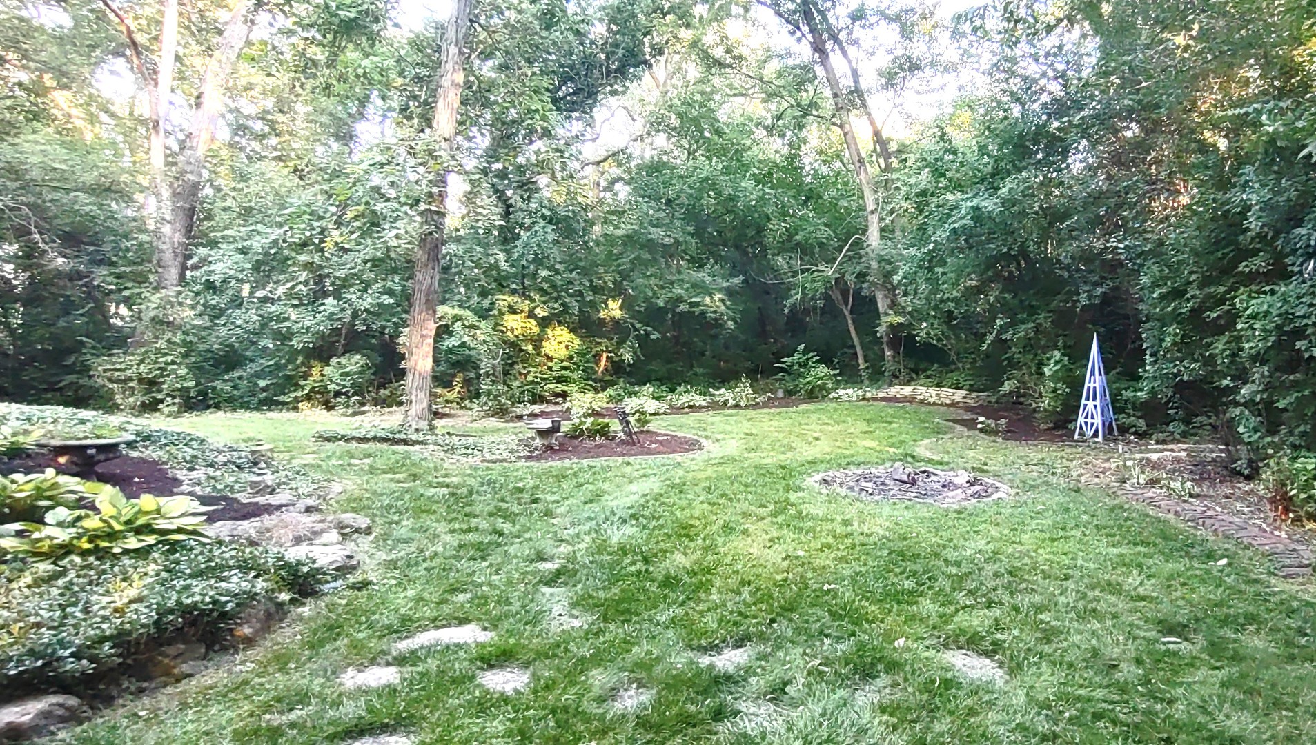 27W161 Mack Road Wheaton, IL 60189 - Photo 37 of 39 a view of outdoor space with a garden and trees