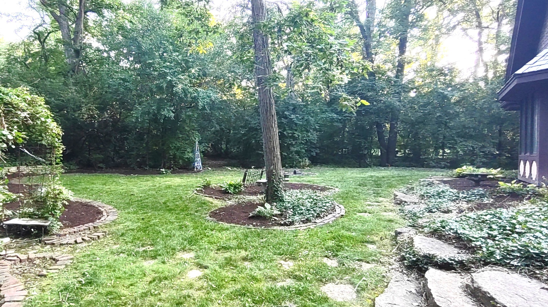 27W161 Mack Road Wheaton, IL 60189 - Photo 38 of 39 a view of a garden with a tree