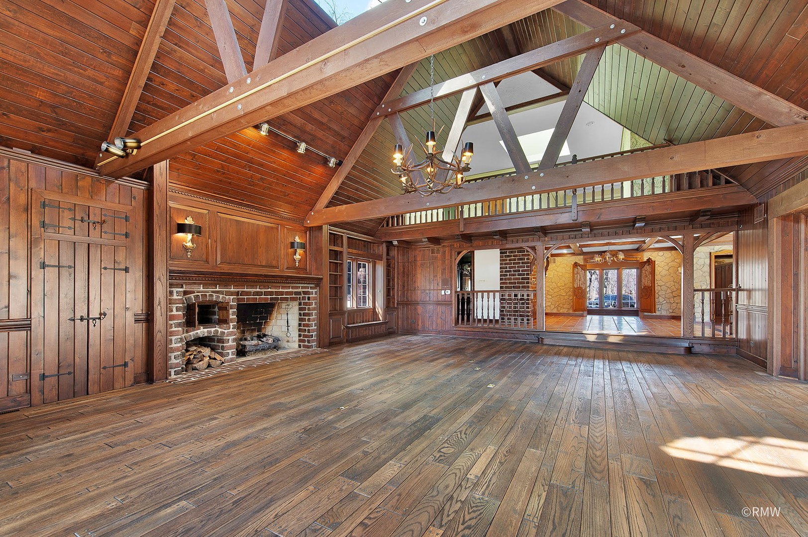 27W161 Mack Road Wheaton, IL 60189 - Photo 9 of 39 a view of a hall with wooden floor