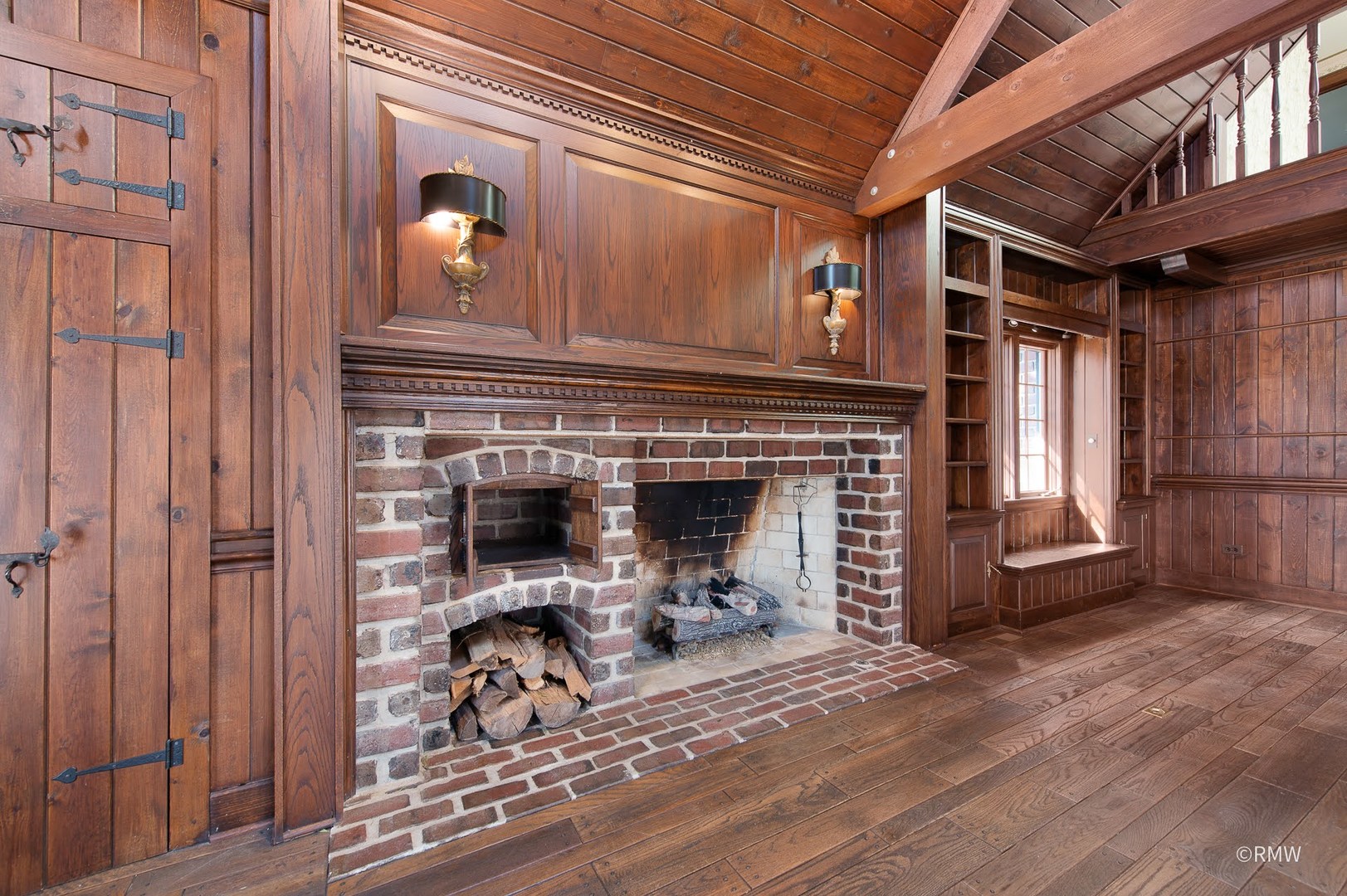 27W161 Mack Road Wheaton, IL 60189 - Photo 10 of 39 a view of a livingroom with furniture and a fireplace