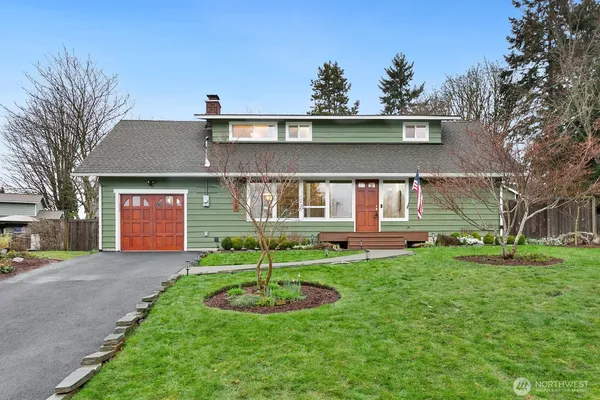 a front view of house with yard