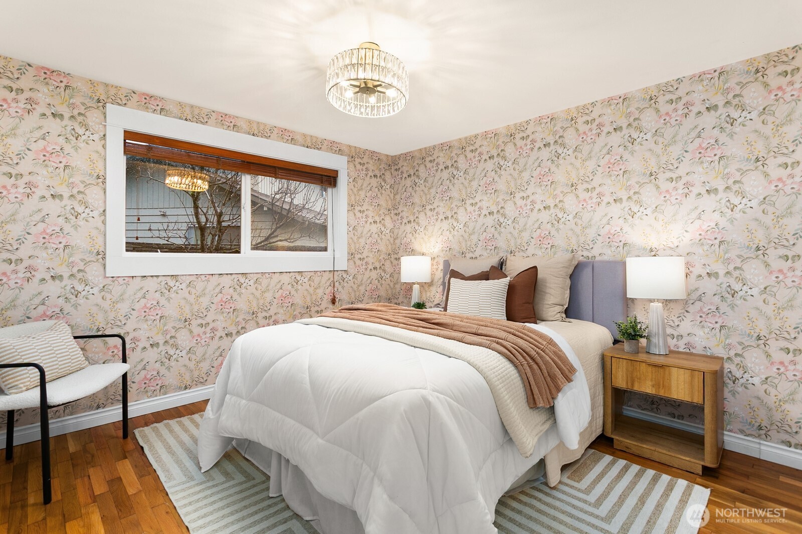 20008 101st Place Northeast Bothell, WA 98011 - Photo 14 of 23 a bed room with a bed and a chair