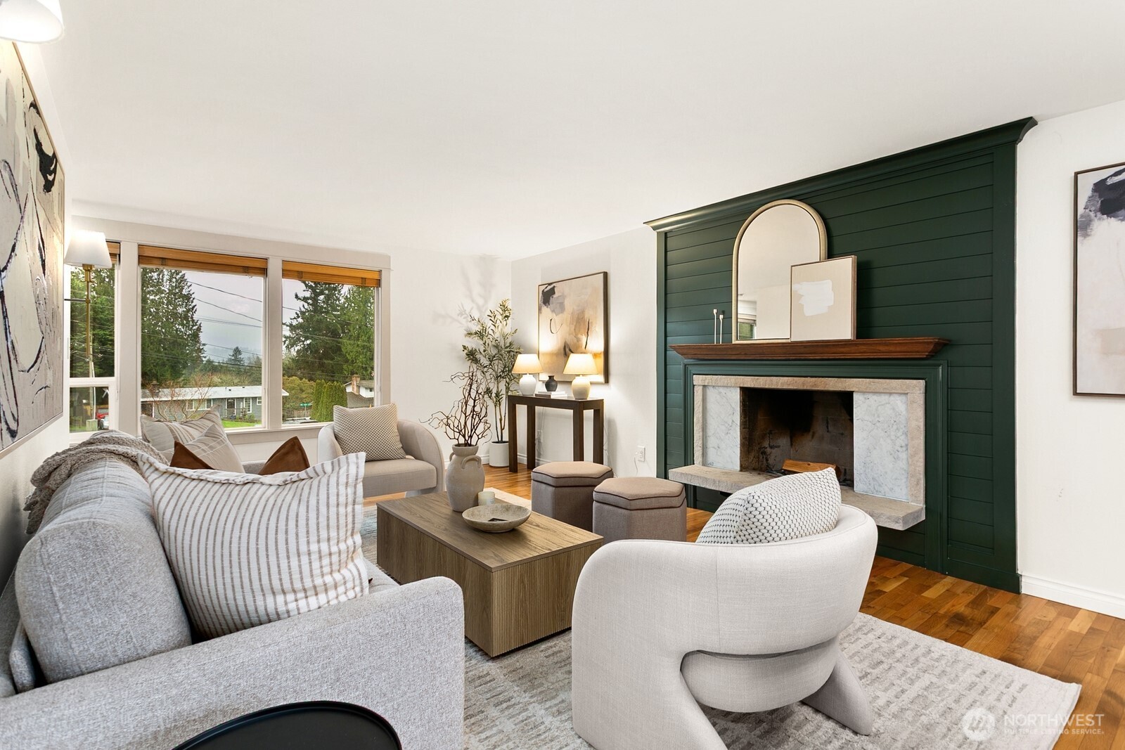 20008 101st Place Northeast Bothell, WA 98011 - Photo 4 of 23 a living room with furniture a fireplace and a large window