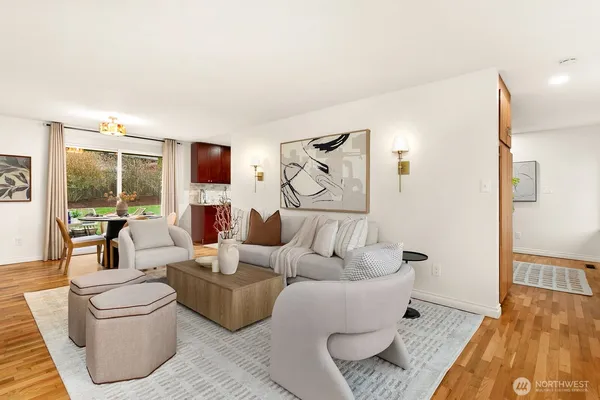 a living room with furniture and a table