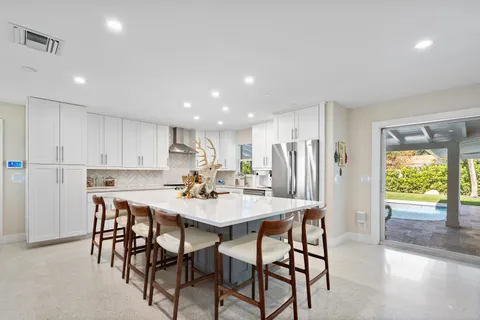 a kitchen with a stove and a microwave