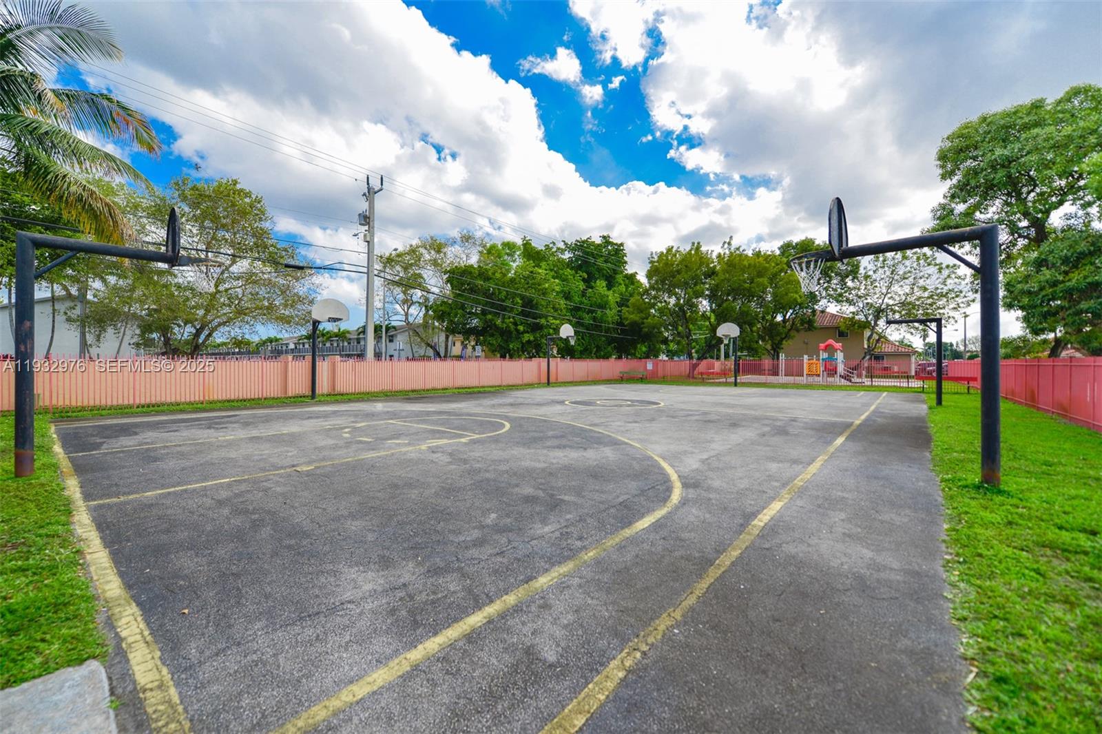 2570 West 67th Place, Unit 212 Hialeah, FL 33016 - Photo 27 of 33 a view of road with a houses