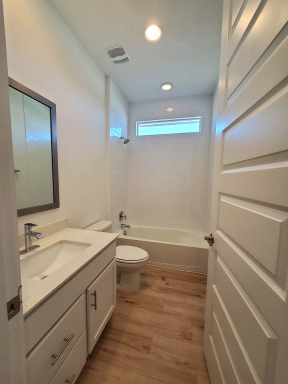 648 Peace Pipe Way Georgetown, TX 78628 - Photo 9 of 12 a bathroom with a granite countertop sink toilet and shower