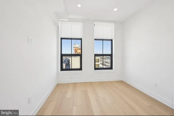 an empty room with windows