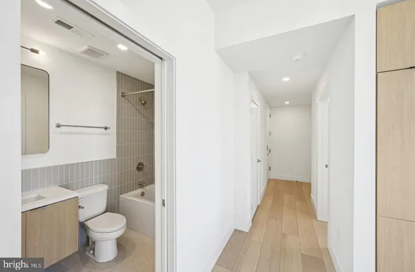 a bathroom with a toilet and a sink
