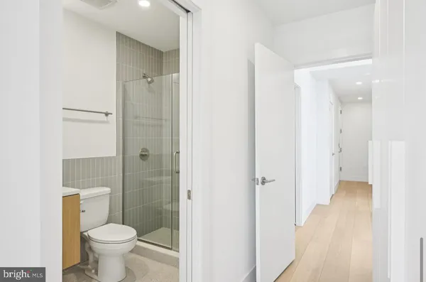 a bathroom with a toilet and a sink