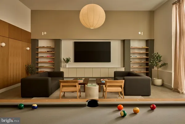 a living room with a couch and a flat screen tv