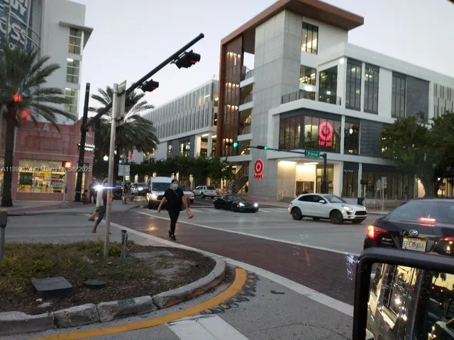 a view of a street with cars