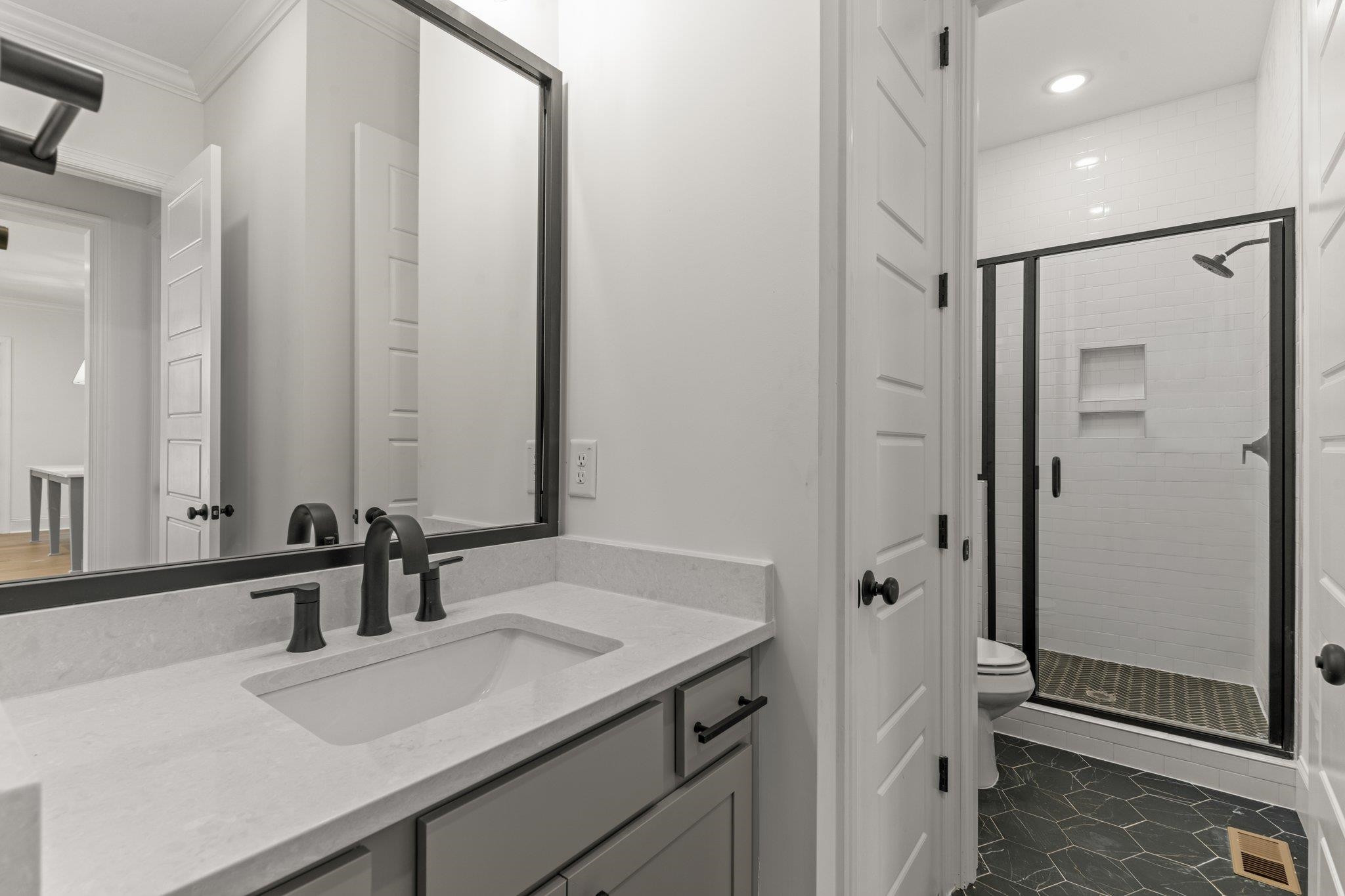 9316 Field Maple Court Raleigh, NC 27613 - Photo 32 of 42 First floor guest bathroom