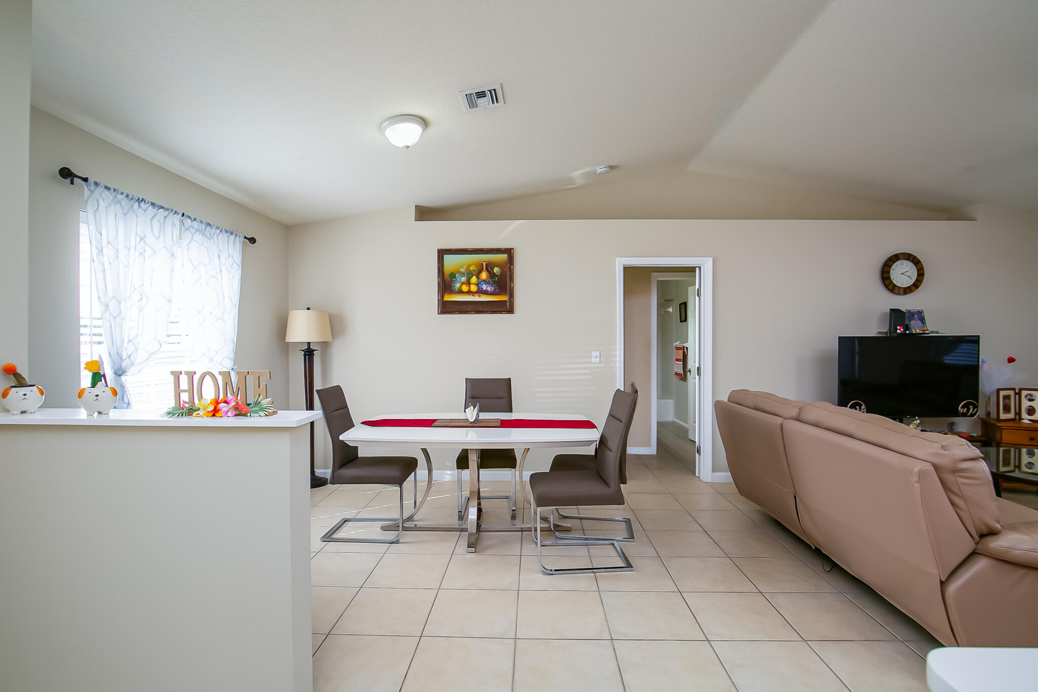 2065 Southwest Gemini Lane Port St. Lucie, FL 34984 - Photo 9 of 24 a workspace with furniture and window