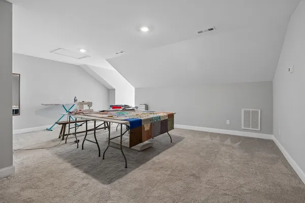 a view of a kitchen area with furniture and chandelier