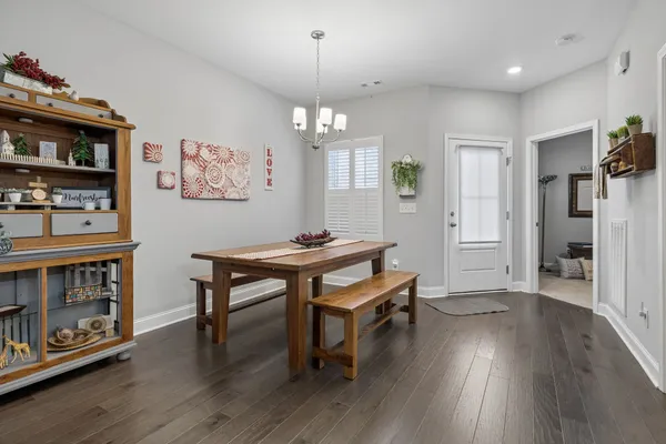 a room with furniture and a wooden floor
