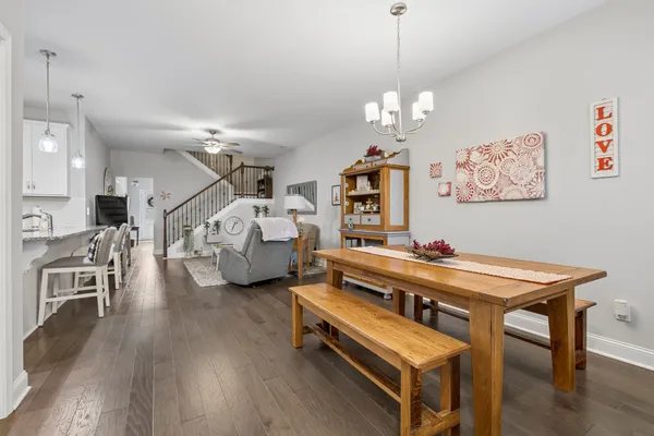 a room with furniture and a wooden floor