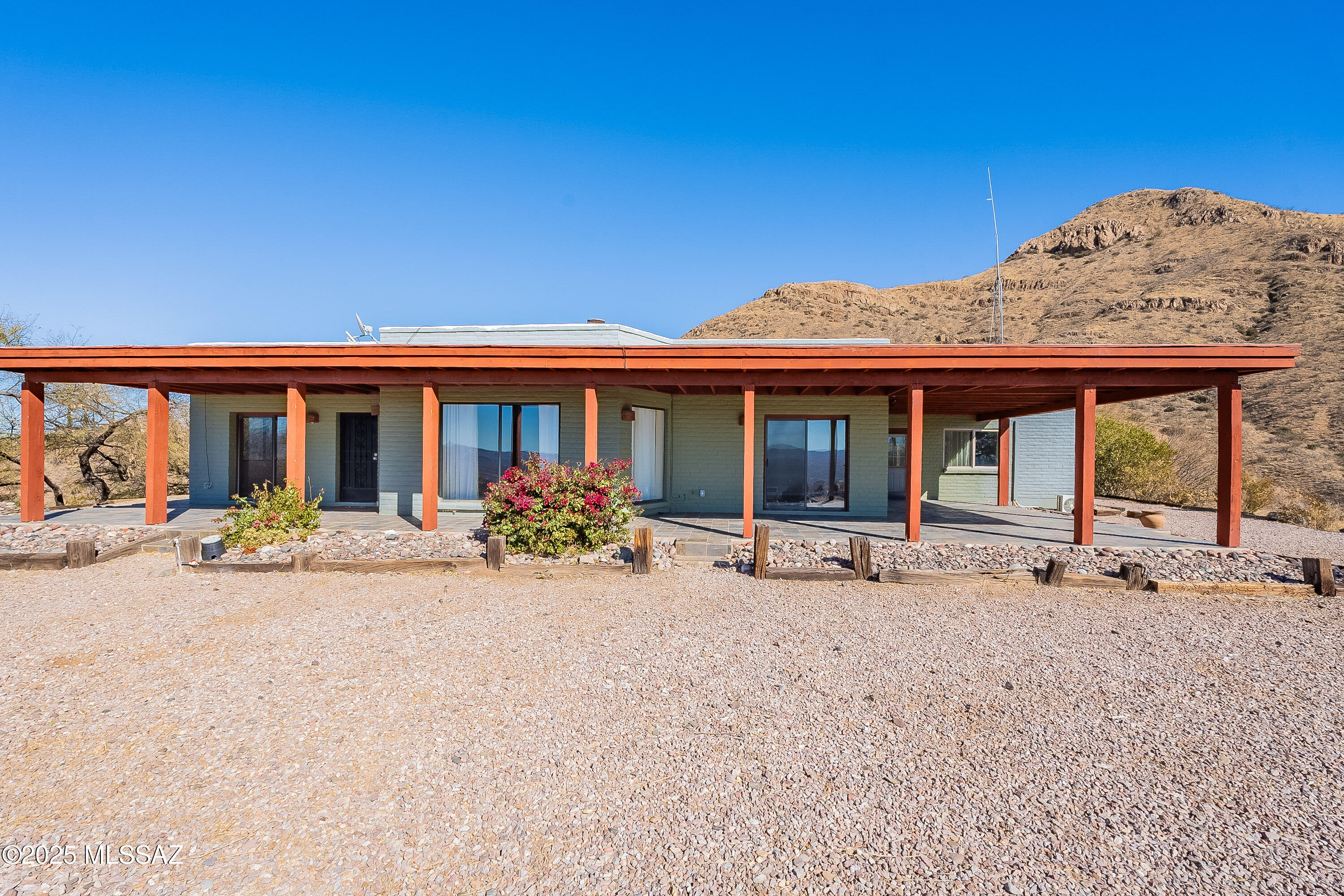 467 Camino Osito Rio Rico, AZ 85648 - Photo 1 of 50 a view of a house with backyard sitting area and porch