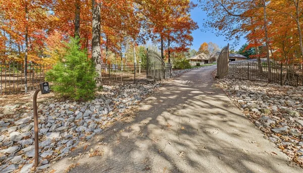 a balcony with furniture and wooden floor