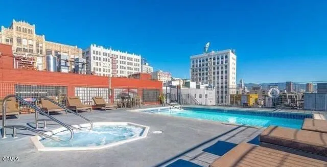 a view of a balcony with chairs