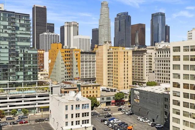 a view of a city with tall buildings