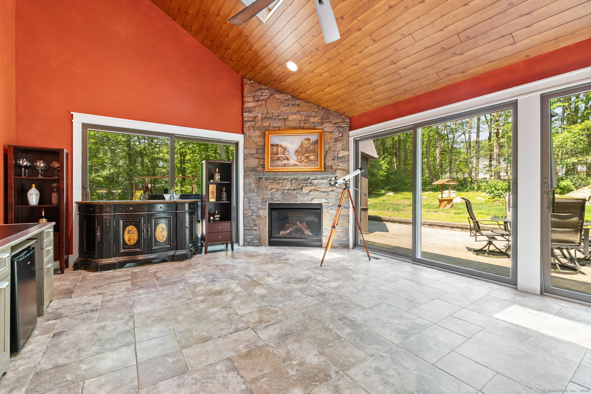 254 Haley Road Groton, CT 06355 - Photo 14 of 40 a view of an empty room with a fireplace and a window