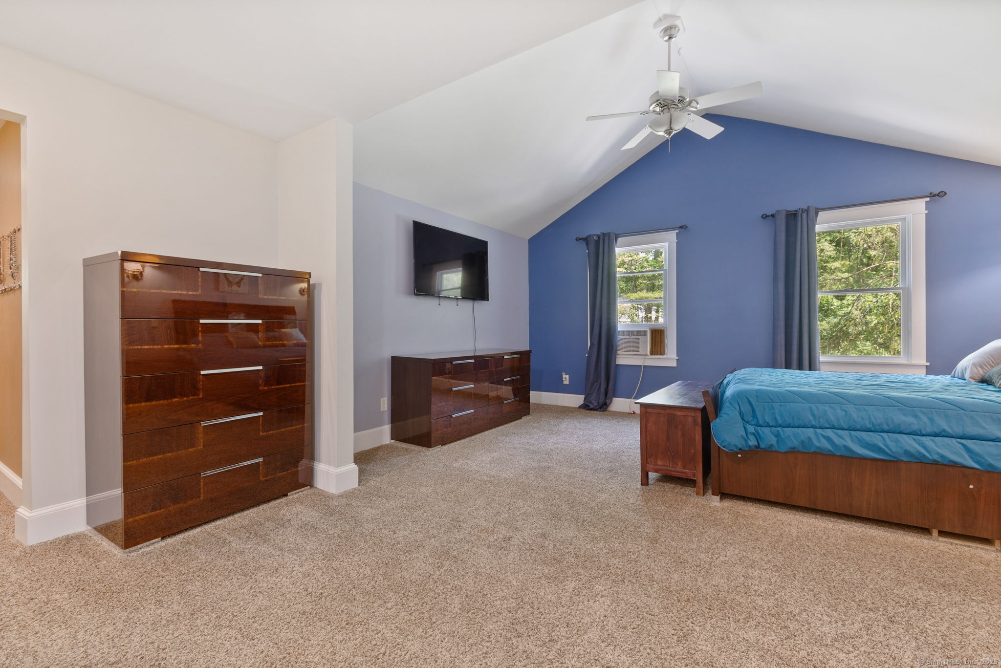 254 Haley Road Groton, CT 06355 - Photo 23 of 40 a spacious bedroom with a bed and a dresser