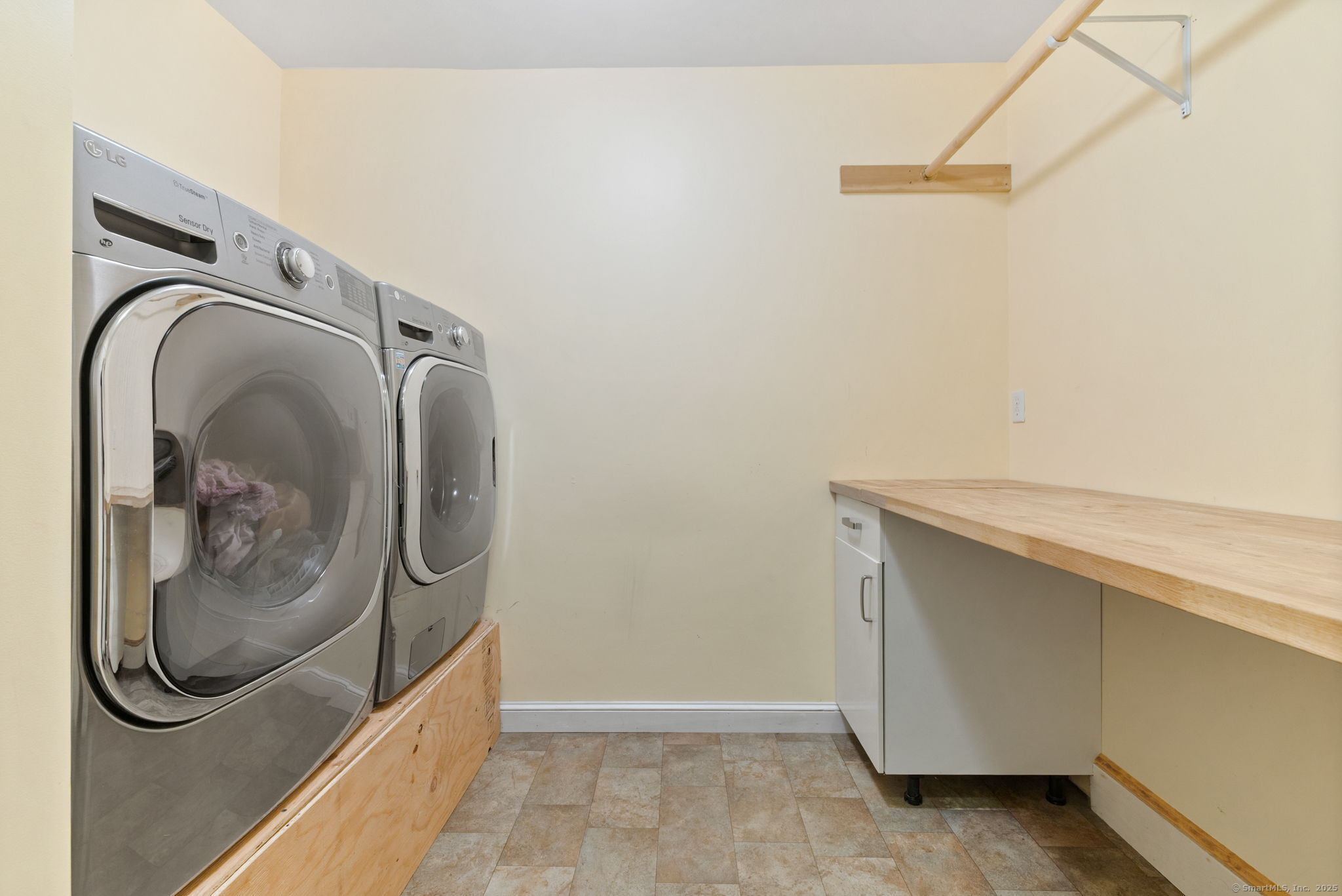 254 Haley Road Groton, CT 06355 - Photo 35 of 40 a bathroom with a glass shower door and mirror